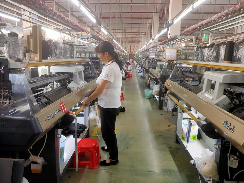 Operators working at an assembly line