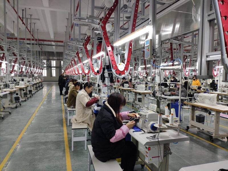 Long assembly line with overhead rail system